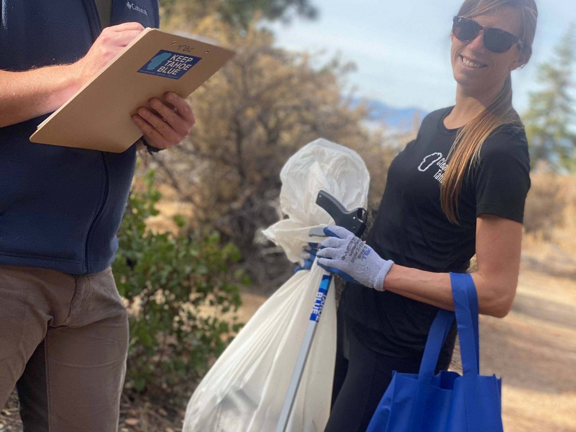 a man standing next to a woman