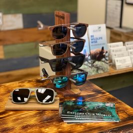 a stack of flyers on a table