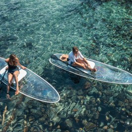 a man flying through the air while riding a skateboard