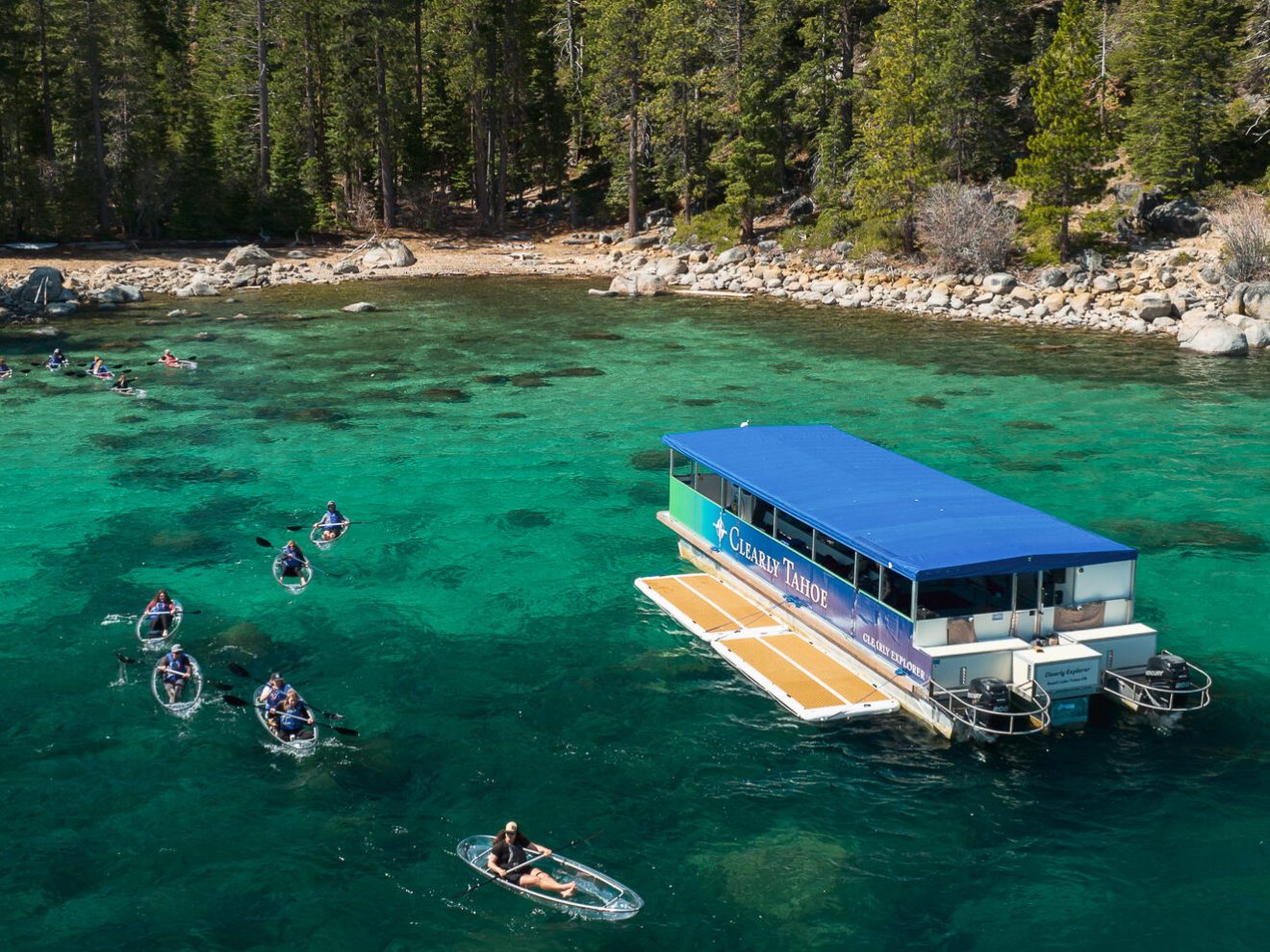 a body of water surrounded by trees