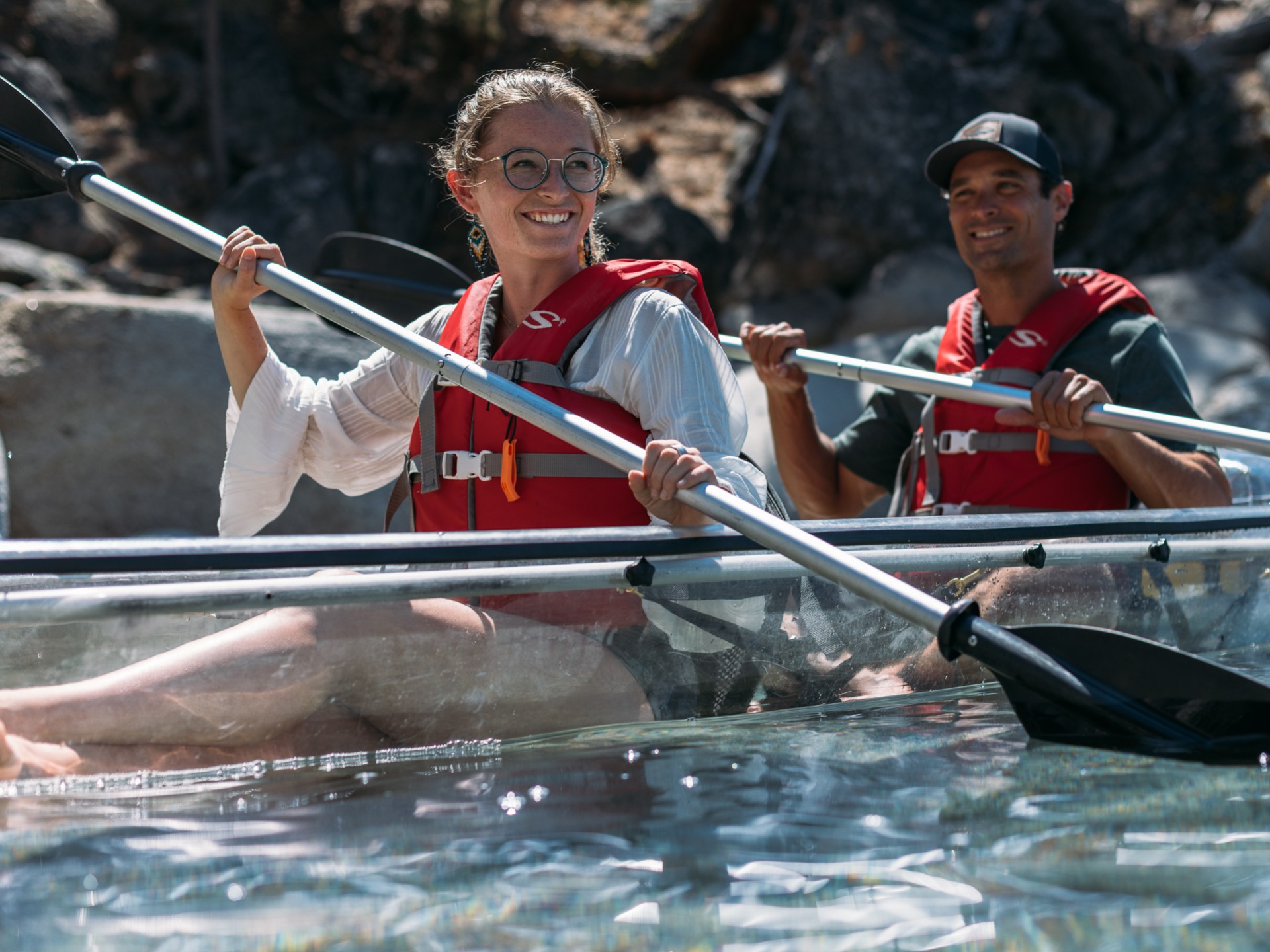 a man riding on the back of a boat