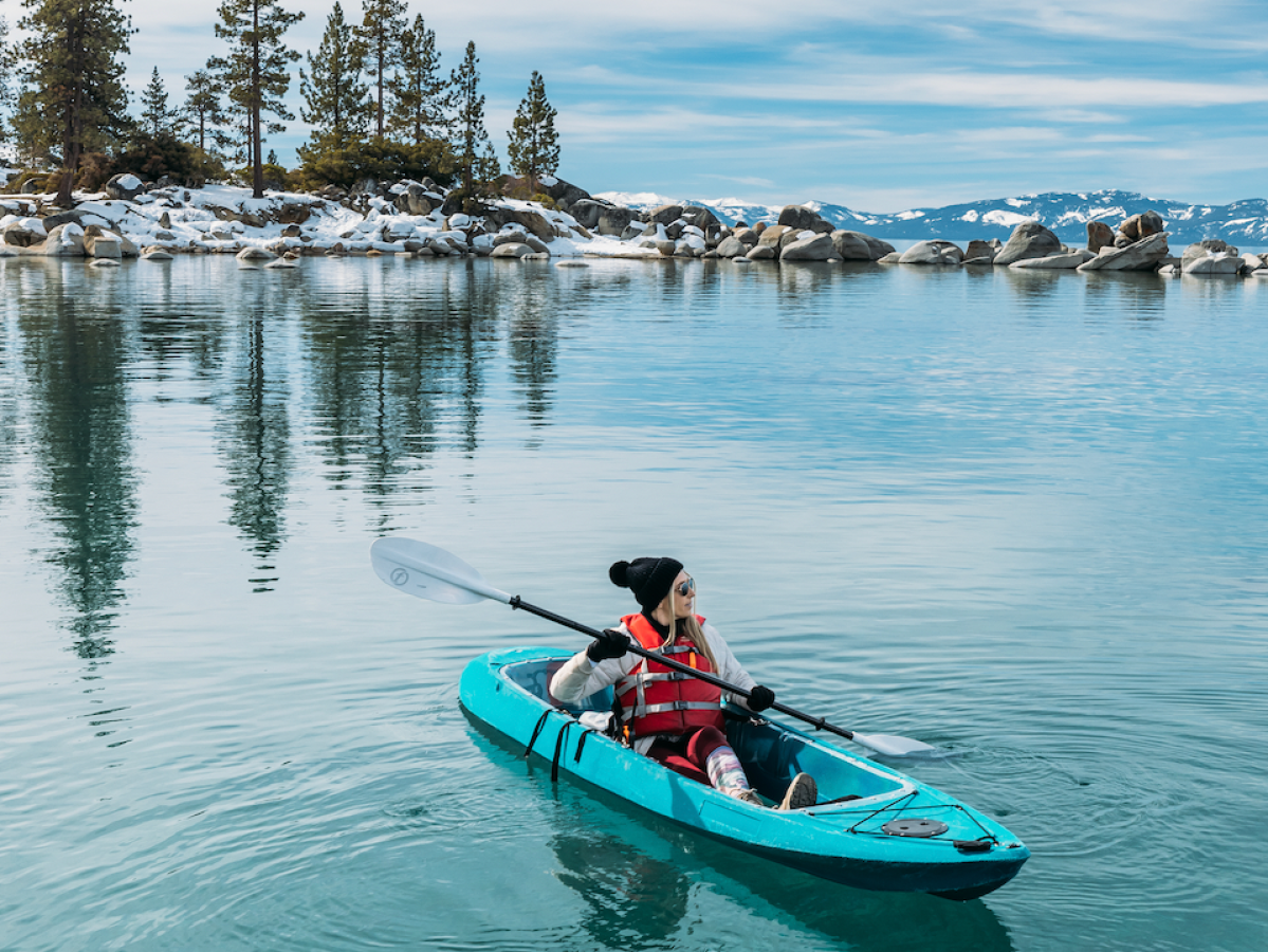 a small boat in a body of water