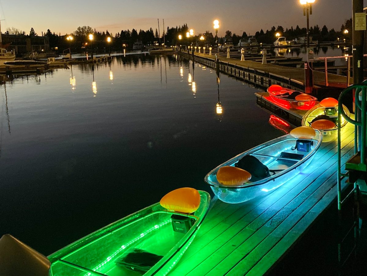 a boat is docked next to a body of water