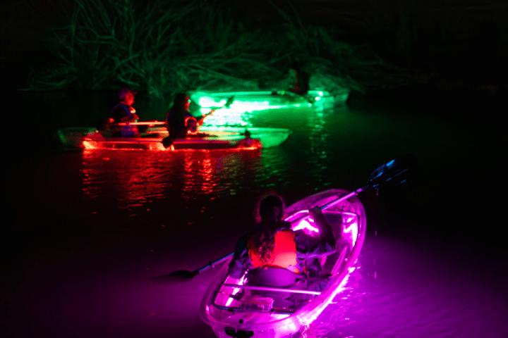 a boat that is lit up at night