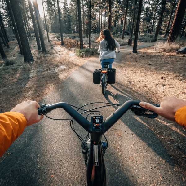 a person lying on a bicycle