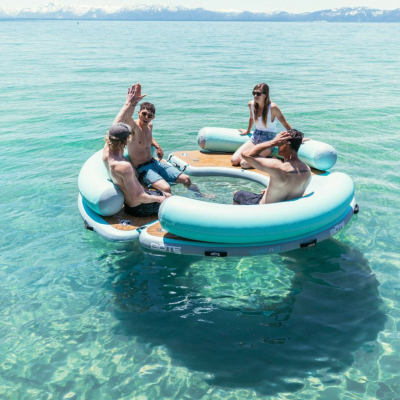 a group of people in a boat on a body of water