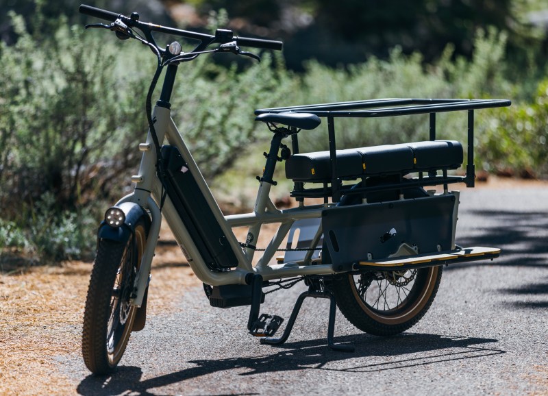 a bicycle is parked next to a motorcycle